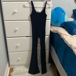 Black slim fitting long flare pant body suit